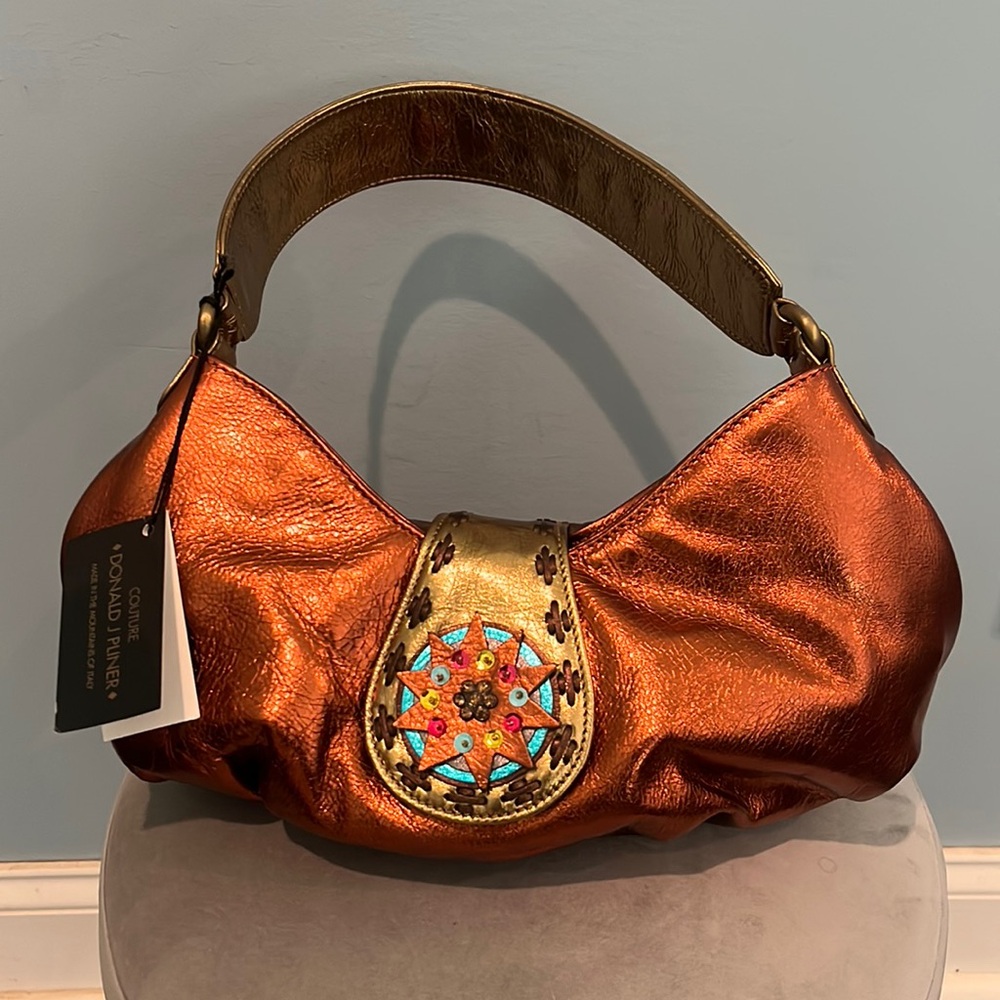 Donald J Pliner metallic baguette NWT